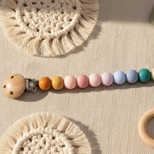 Schnullerkette Regenbogen Perlen, Silikon, Holzclip, Schnullerband