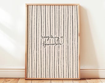 May include: A framed print with a light wood frame. The artwork features a cream-colored background with vertical black lines and dotted lines. The text "everything is figureoutable" is written in black script.