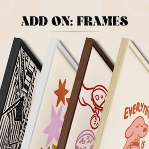 May include: Four rectangular picture frames in black, white, dark wood, and light wood finishes, displayed side-by-side. The text ADD ON: FRAMES is centered at the top. Each frame contains a different graphic print, including black and white line art, colorful stars, red line drawings, and a pink dog illustration.
