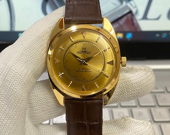 Vintage Roamer Mechanical Watch: Refurbished Golden Face, Brown Band