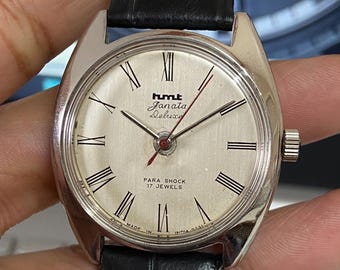 Reloj HMT Janata Deluxe para hombre, de cuerda manual, con correa de piel de cocodrilo negra.