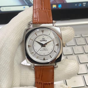Vintage Refurbished Roamer Mechanical Hand Winding 17 Jewels White Face Brown Band Men's Wrist Watch A57