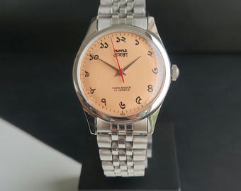 Reloj vintage HMT Bangla con esfera de melocotón y cuerda manual