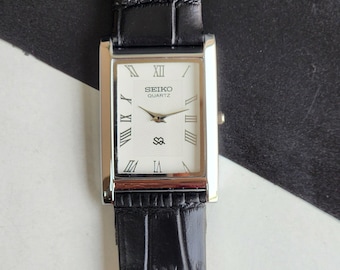 Vintage Refurbished Seiko Slim White Face Men's Watch Black Strap 26MM