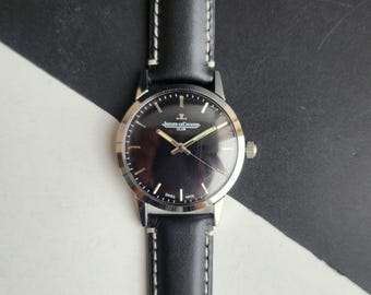 Vintage Jaeger-LeCoultre Hand-Winding Watch: Black Face, Stainless Steel, Leather Strap
