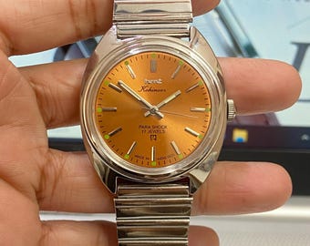HMT Kohinoor Hand Winding Watch: Orange Face, Stainless Steel, 36mm