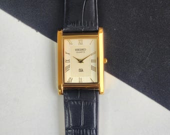 Vintage Refurbished Seiko Slim Golden Face Men's Watch Black Strap 26MM