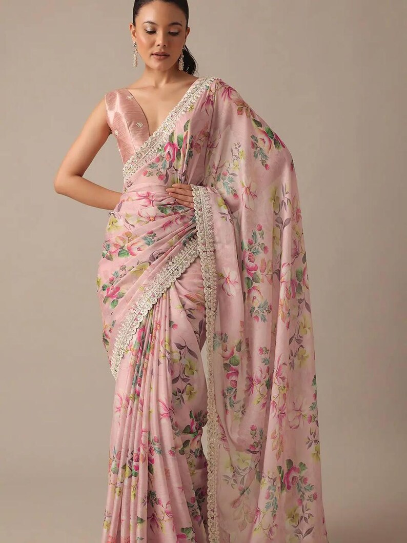LIGHT PINK FLORAL PRINT GEORGETTE RUFFLE SAREE WITH STITCHED BLOUSE