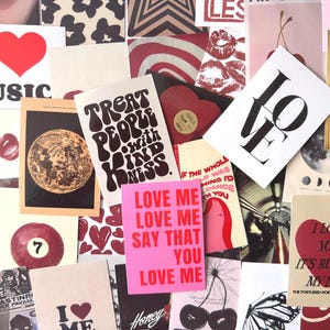 May include: A collage of various cards and prints with a romantic theme. The cards feature phrases like "Love Me" and "Treat People with Kindness," along with images of hearts, cherries, and a guitar. The color palette includes red, pink, black, and white.