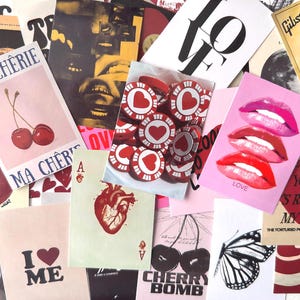 May include: A collage of various cards and images with a romantic theme. Includes cards with cherries, lips, hearts, and the words "LOVE" and "MA CHERIE". Also features a guitar and a 7-ball.