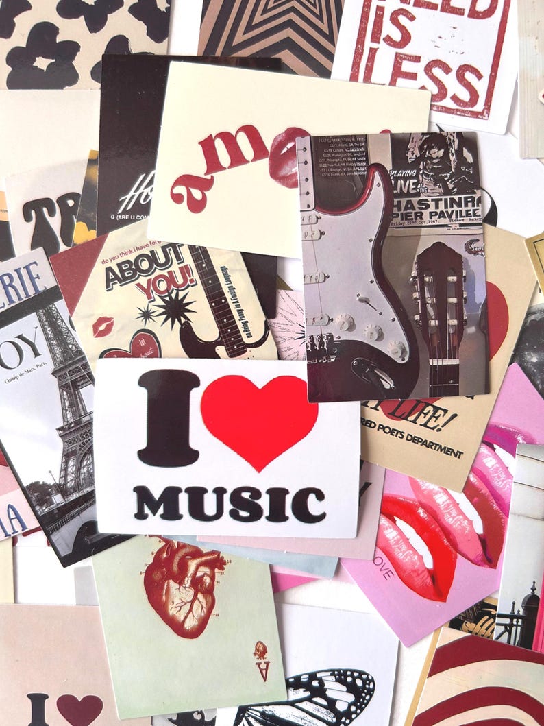May include: A collage of various stickers and cards with diverse designs. Notable elements include a card with "I ❤️ MUSIC" text, a guitar illustration, and lips. Other cards feature text like "ABOUT YOU!" and "LIFE!"