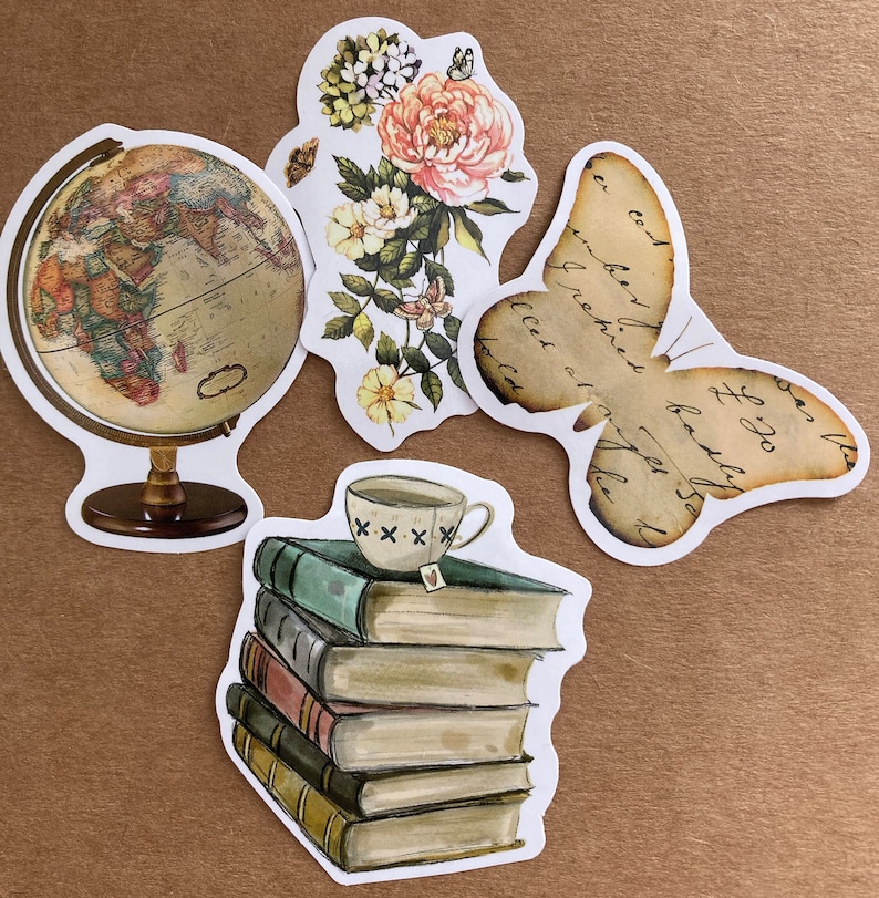 May include: A set of five vintage-style stickers featuring a globe, a butterfly, a stack of books, a teacup, and a floral design. The stickers are printed on white paper with a distressed, vintage look.