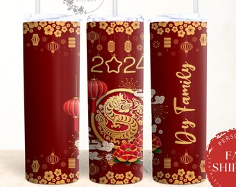 May include: Three red and gold stainless steel tumblers with a Chinese New Year theme. The center tumbler features a gold dragon and the text "2024". The tumbler on the right has the text "My Family".