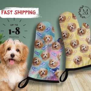 May include: Two oven mitts with a dog's face pattern. The mitts are yellow and blue with a black trim. The text "Ollie" is repeated on the mitts. The text "FAST SHIPPING" and "UP TO 1-8 PHOTOS" is visible in the background.