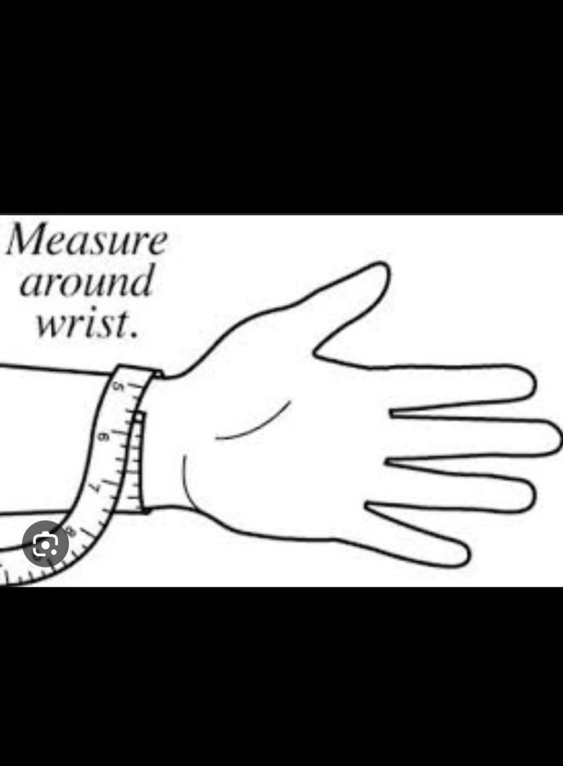 May include: A black and white illustration of a hand with a measuring tape wrapped around the wrist. The text "Measure around wrist." is above the hand.