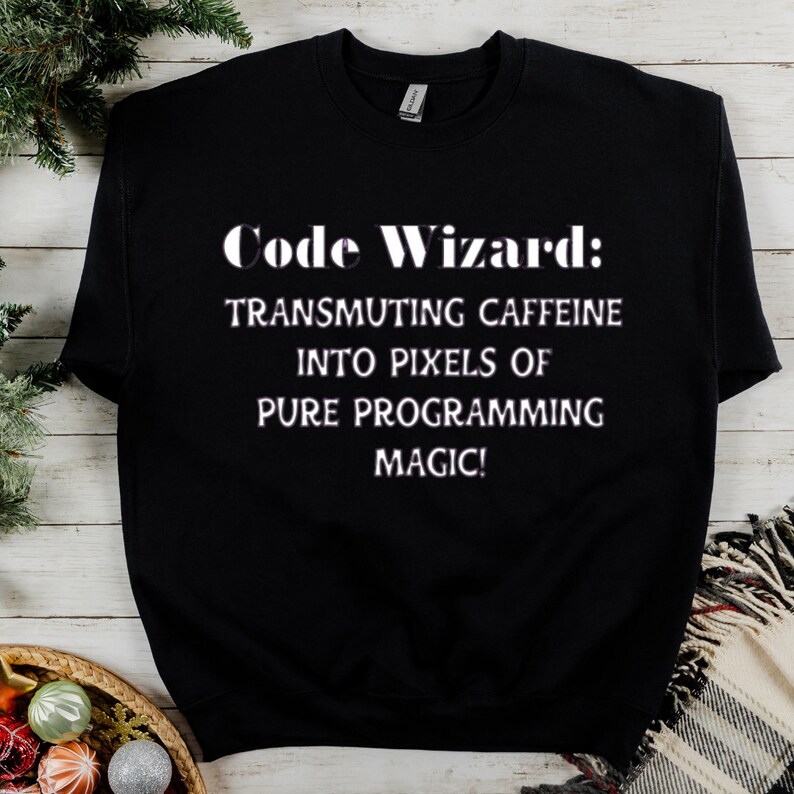 May include: Black sweatshirt with white text that reads "Code Wizard: Transmuting caffeine into pixels of pure programming magic!"