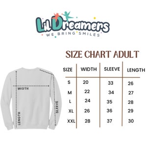 May include: Size chart for adult sweatshirts with measurements in inches for width, sleeve length, and overall length. Sizes include S, M, L, XL, and XXL.