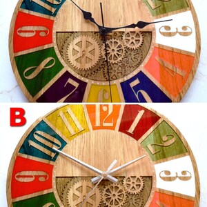 May include: A colorful wooden clock with Roman numeral hour markers and a gear design in the center. The clock has a black and white hand set in the first image and a white hand set in the second image.