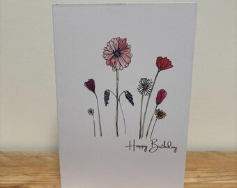 Une carte d'anniversaire Fleurs d'avril l'a conçue.