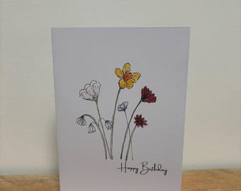 Une carte d'anniversaire de fleurs de mars conçue pour elle