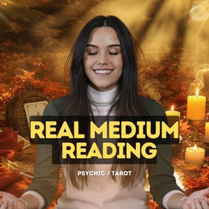 May include: A woman with long dark hair and a white turtleneck smiles with her eyes closed. The text "REAL MEDIUM READING" is displayed in a yellow box, with "PSYCHIC / TAROT" below. Lit candles and autumn leaves are in the background.