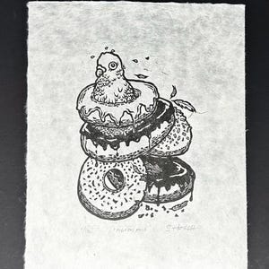 One Of a Kind Hand-Printed Lino Print on Lokta Paper | quirky print featuring pigeon with donuts | unframed 8” x 10” art