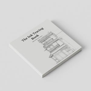 Pode incluir: Um livro quadrado de capa mole com uma capa branca apresentando um desenho de linhas pretas de um edifício japonês de vários andares. O texto na capa diz The Ink Tracing Book Japan Architecture Edition.