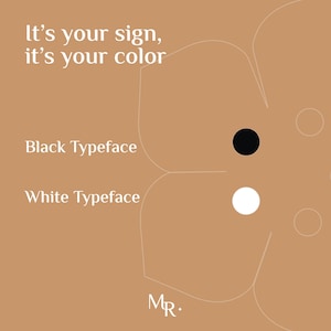 May include: A tan graphic display featuring the text It's your sign, it's your colour. The image includes the labels Black Typeface and White Typeface next to a solid black circle and a solid white circle. A faint outline of a flower shape is visible.