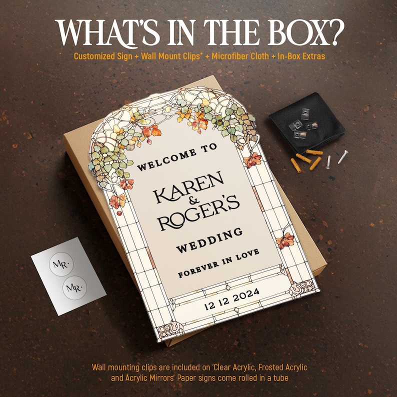 May include: A rectangular wedding sign with a stained-glass style border featuring autumn leaves. The text reads: WELCOME TO KAREN & ROGER'S WEDDING FOREVER IN LOVE 12 12 2024. Includes a cardboard box, wall mount clips, and a microfiber cloth.