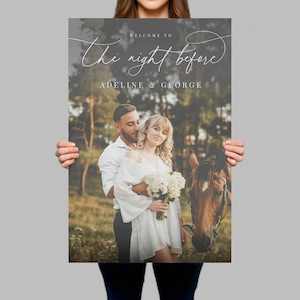 May include: A rectangular vertical poster featuring a photograph of a couple embracing next to a brown horse in a field. The text reads "WELCOME TO The night before ADELINE & GEORGE" in white lettering against a dark grey background overlay.