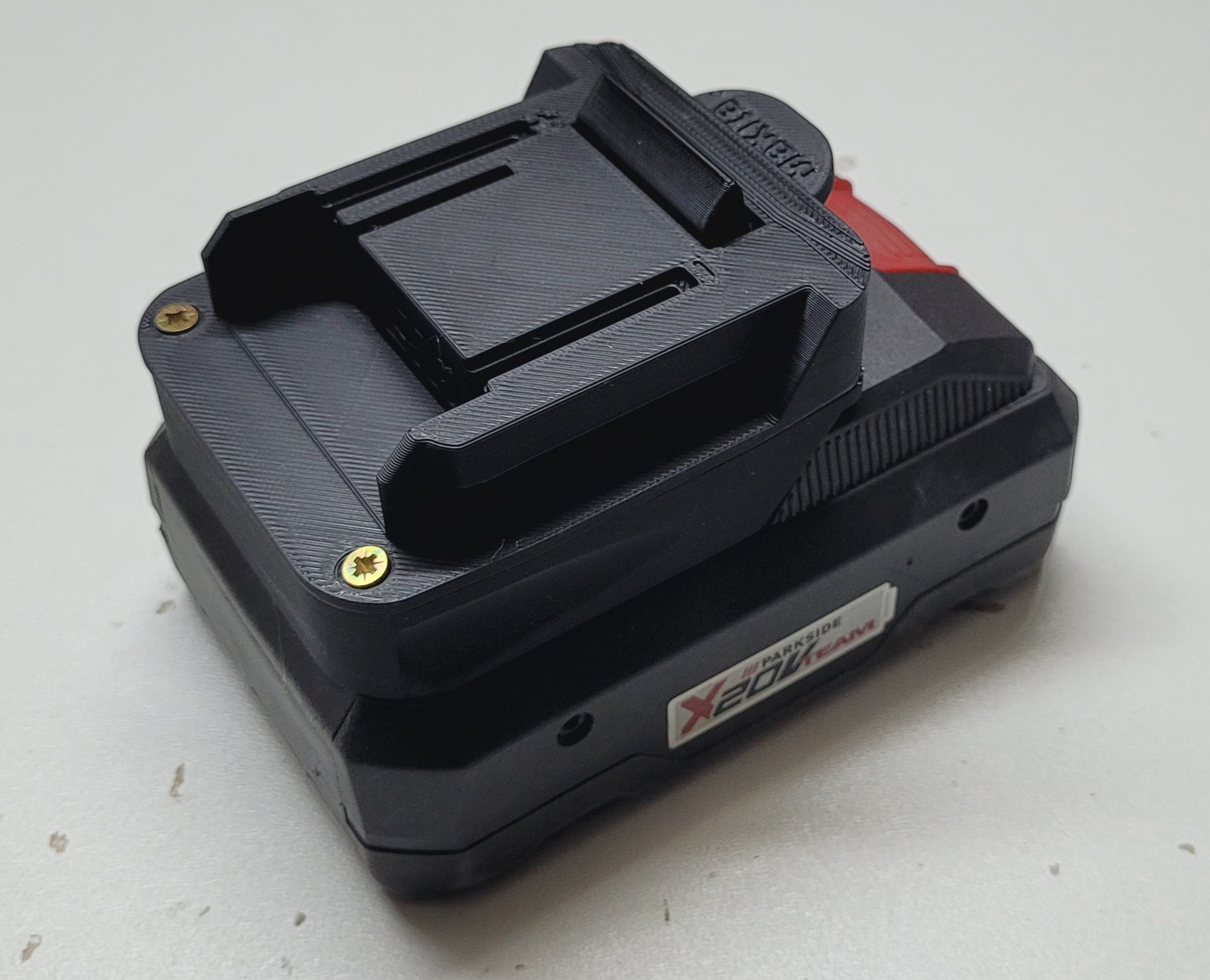 Archivo STL Adaptador para batería Parkside X20V a dispositivo