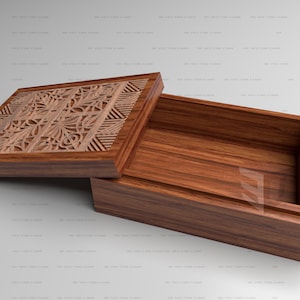Puede incluir: Una caja de madera con una tapa tallada. La tapa está abierta y el interior de la caja es visible. La caja está hecha de madera oscura con un acabado natural.