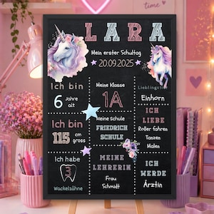 May include: A black chalkboard-style sign with the name "LARA" at the top, featuring unicorn illustrations and text. The sign includes details like age, height (115 cm), and school information, perfect for a child's first day of school.