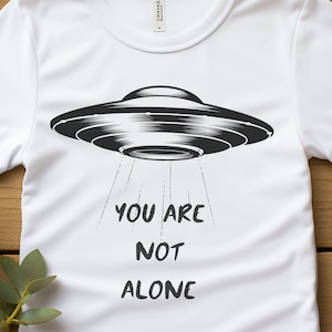 You Are Not Alone UFO Graphic Tee - Space Alien Design