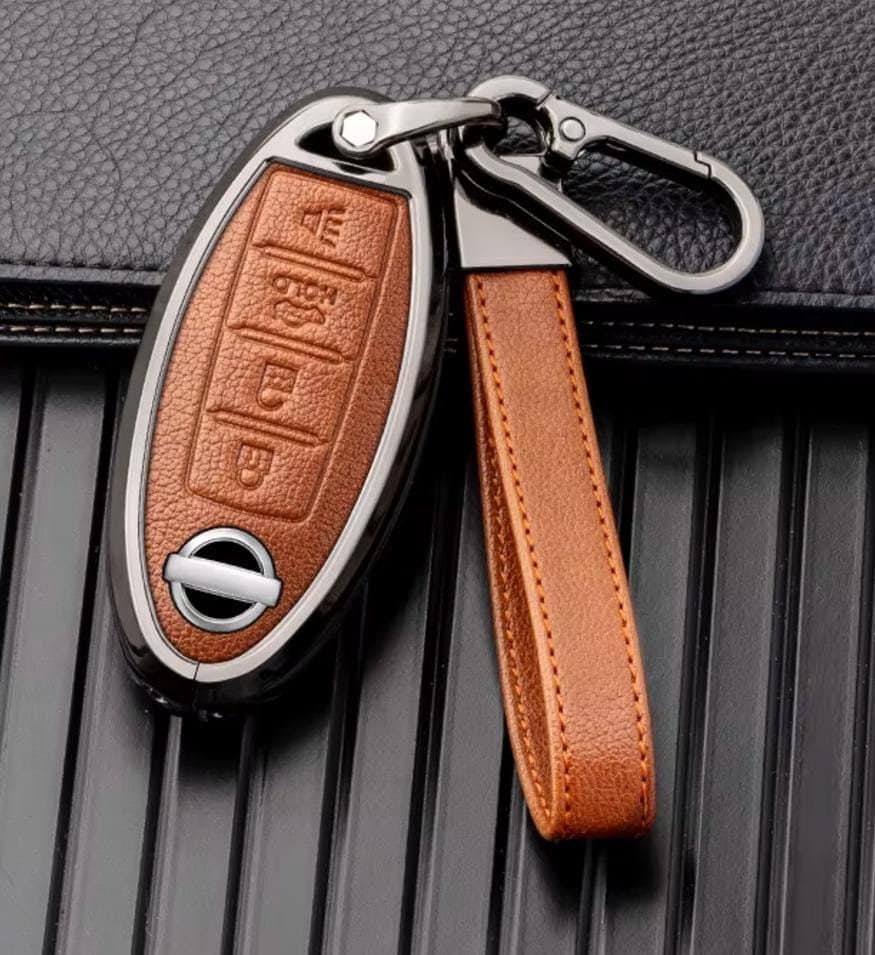 Nissan aanpasbare leren en aluminium sleutelhangerhoes met sleutelhanger (4 knoppen)