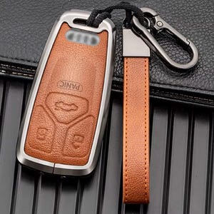 Audi Customizable Key Fob protector cover set made of Aluminum and Leather, with a full Keychain