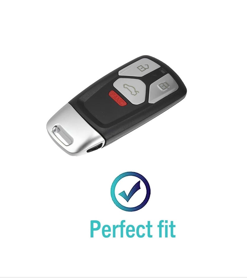 May include: A black and silver car key with four buttons. The buttons are labeled with icons for unlock, lock, trunk, and panic. The key has a silver metal key ring.