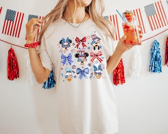 Noeud coquette chemise patriotique Mickey et ses amis 4 juillet Disney, WDW Disneyland Family America 4 juillet, t-shirt rouge, blanc et bleu des États-Unis