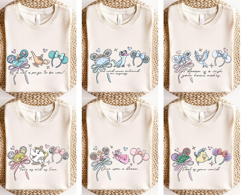 Puede incluir: Camisetas color crema con gr&aacute;ficos de dibujos animados coloridos y texto. Los dise&ntilde;os incluyen personajes, lazos y frases como "I'm not a prize to be won!" y "Tale as old as time." Las camisetas son probablemente para fans de pel&iacute;culas de animaci&oacute;n.