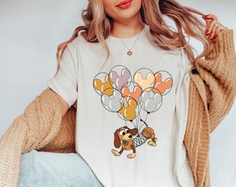 Maglietta Slinky Dog con palloncini di Topolino, maglietta Toy Story, regalo Disney per gli amanti dei cani, maglietta per le vacanze in famiglia a Disneyland, maglietta Magic Kingdom, Disney