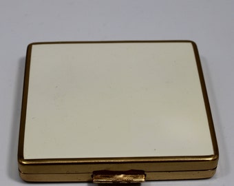 Vintage Small Square Gold Tone Compact - Made in West Germany - Cream Colored Bakelite or Plastic - Very Nice Condition. Brand Unknown.