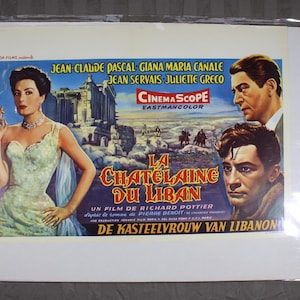 May include: Vintage movie poster for "La Chatelaine du Liban" featuring actors Jean-Claude Pascal and Giana Maria Canale. The poster has a woman in a light green dress, a man, and a landscape with text in French and Dutch.