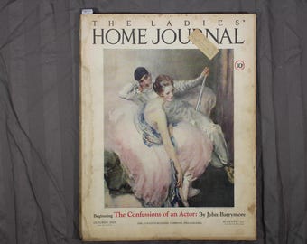 May include: The Ladies' Home Journal magazine cover from October 1919 featuring a painting of two people in a theatrical setting. The text on the cover reads "The Confessions of an Actor: By John Barrymore".