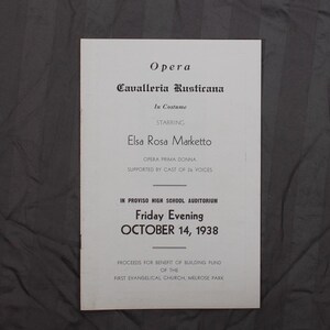 May include: A black and white program for an opera performance of Cavalleria Rusticana, starring Elsa Rosa Marketto as the opera prima donna. The performance is scheduled for Friday evening, October 14, 1938, at the Proviso High School Auditorium. Proceeds from the event will benefit the building fund of the First Evangelical Church in Melrose Park.
