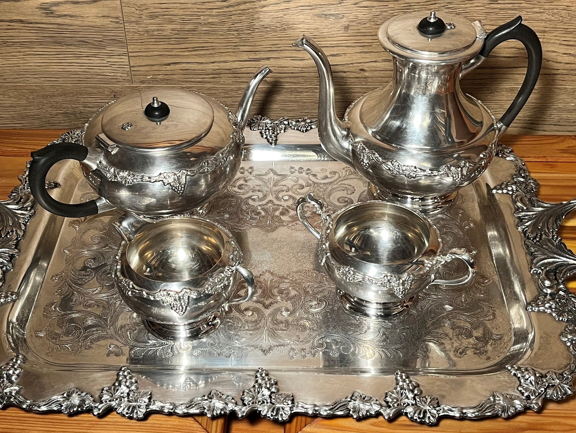 VINTAGE SILVER PLATE ON COPPER DOUBLE HANDLED BABY CUP AND