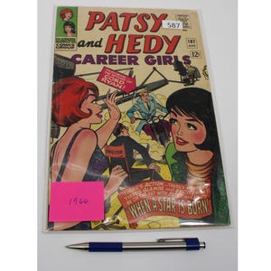 May include: A vintage comic book titled "Patsy and Hedy Career Girls" from Marvel Comics Group. The cover art features two women and a man on a motorcycle, with text that reads "When a Star is Born!" and "Featuring the Action of Cord Ryan!"