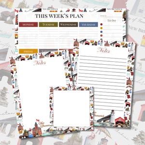 May include: A stationery set featuring a weekly planner with headers for Monday through Thursday and a To Do list, two lined note pads, and a square memo pad. Each sheet is decorated with illustrations of New Brunswick landmarks.