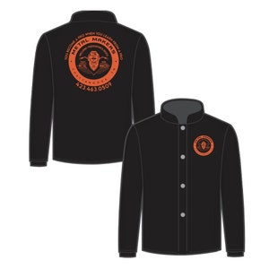 May include: Black long-sleeve shirt with a button-up front and a mandarin collar. The shirt features an orange circular logo with the text "METAL MAKERS" and "WELDING - FABRICATION CLASSES". The phone number 423.463.0509 is also visible.
