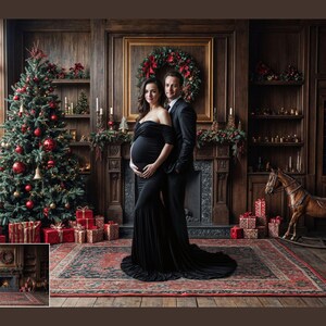 May include: A pregnant woman in a black dress stands with a man in a suit in front of a fireplace decorated with a Christmas wreath. A Christmas tree with red and gold ornaments is in the background.