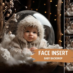 May include: A baby in a white fur-trimmed coat sits inside a clear plastic snow globe. The snow globe is surrounded by white fluffy clouds and a brown wooden base. The background is a dark brown with twinkling lights.
